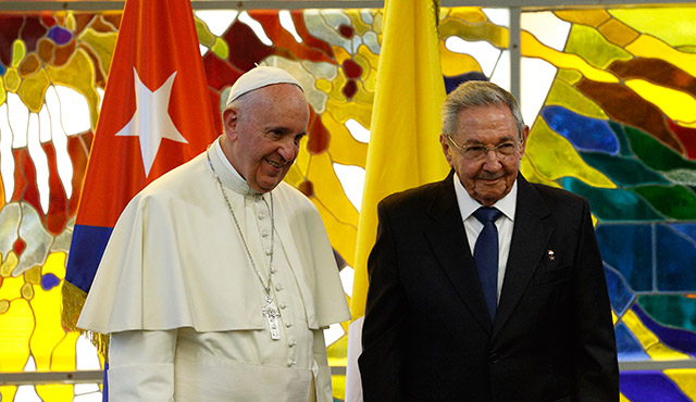 POPE FRANCIS POSES WITH CUBA'S PRESIDENT RAUL CASTRO DURING IN THE PALACE OF THE REVOLUTION IN HAVANA SEPT. 20. (CNS PHOTO/PAUL HARING)